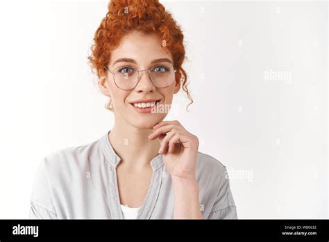 Close Up Impressed Smiling Tender Redhead Woman With Blue Eyes Curly Hair Combed In Bun Touch