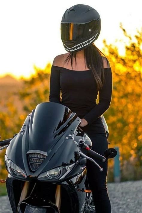 Biker Girl Wearing A Super Cool Motorcycle Helmet With Shark Teeth