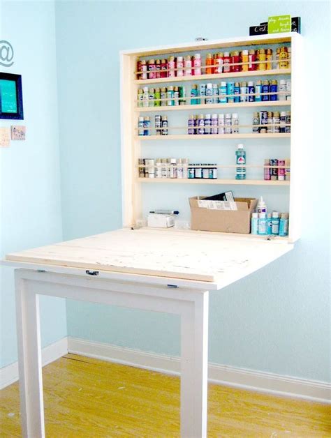 I need to put in a fold down shelf in my laundry room. 20 Space-Saving Fold-Down Desks
