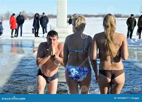 Unidentified People Swimming In Cold Water During Epiphany Editorial Photography Image Of