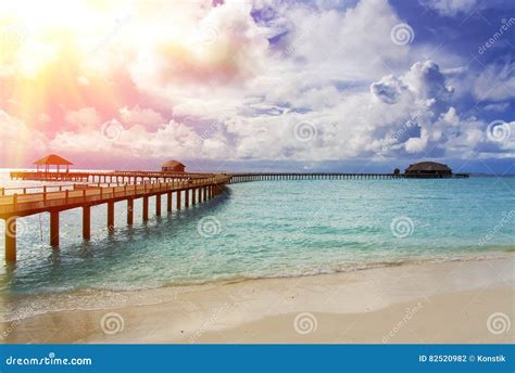 Maldives The Turquoise Sea In Sunshine And The Wooden Bridge Over