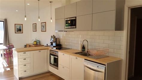 On the back of your cabinets, there should be hooks. Our IKEA kitchen: Savedal cabinets, birch worktops, veddinge upper cabinets, subway tiles and ...
