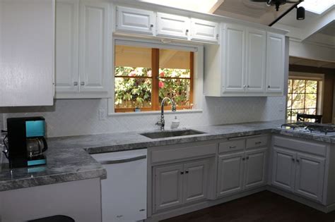 A brilliant, almost sparkling white, this clean shade suggests clarity and simplicity. Finished project. BM San Antonio Grey lower cabinets; BM ...