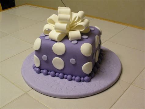 If you've always wondered how to cover a cake with fondant, you've come to the right place! Purple Fondant Square - CakeCentral.com