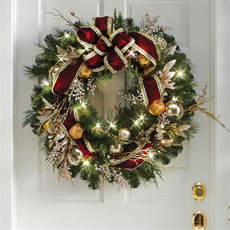 The Cordless Pre Lit Crimson And Gold Holiday Trim Wreath Hammacher