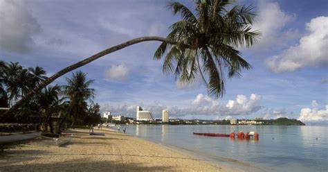 Guam The Paradise Island Of Sandy Beaches And Clear Waters And Firmly In North Koreas