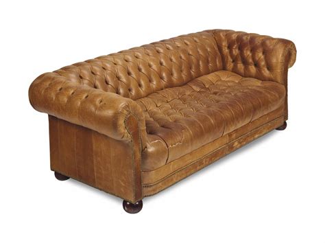 A Button Tufted Tan Leather Covered Chesterfield Sofa Modern
