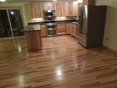 Our wood floors in kitchen guide shows pros of wood floors in kitchens: Kitchen cabinets & hardwood floors