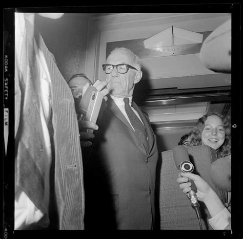 Pediatrician Dr Benjamin Spock Talking With Reporters After Being