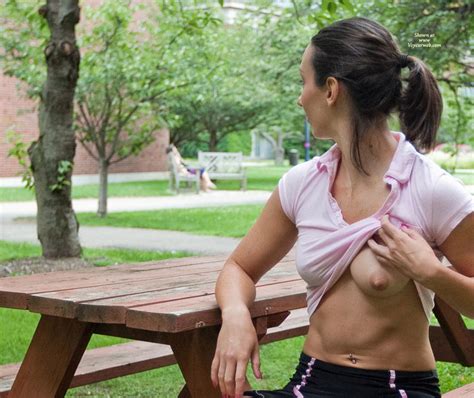 Woman Flashing Her Breast At Picnic Table February