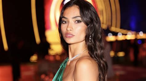 Kelly Gale Shows Off Toned And Tan Figure In Super Sparkly Purple Two