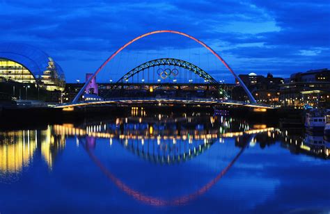The Tyne Bridge Shone Through The Millennium Bridge In Newcastle Upon