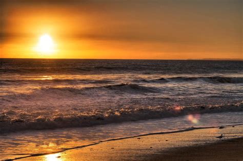 Download Orange Sunset On Malibu Beach Wallpaper