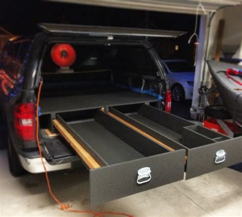 Is there a flat tank that would fit between the pull out rails but not be carried by them, or alternatively mounted flat to the cab(weight should be so lately i've been working on a design for my pullout kitchen for the truck bed that i plan to start building in the upcoming weeks in preparation for. DIY truck bed storage system | Truck bed storage, Diy ...