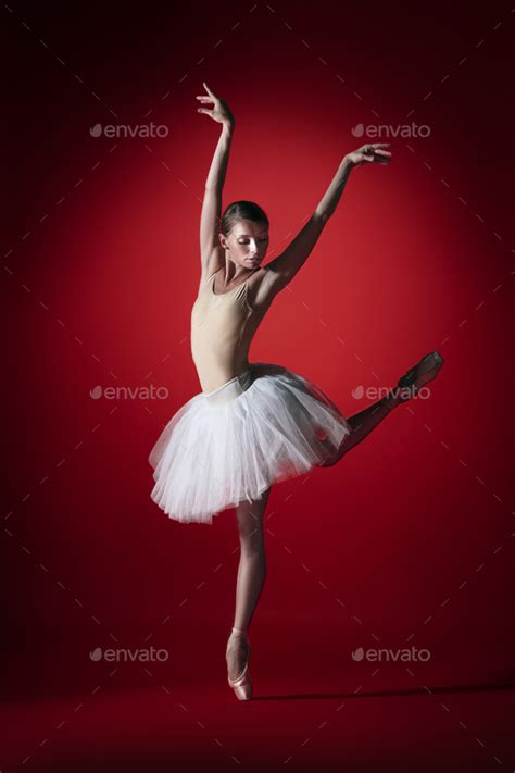 Ballerina Young Graceful Female Ballet Dancer Dancing At Red