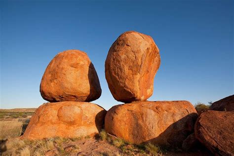 The Devils Marbles Are Huge Granite Boulders Scattered Across A Wide