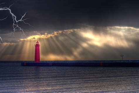 Lightning Over Muskegon Lighthouse Photograph By Jeramie Curtice Fine