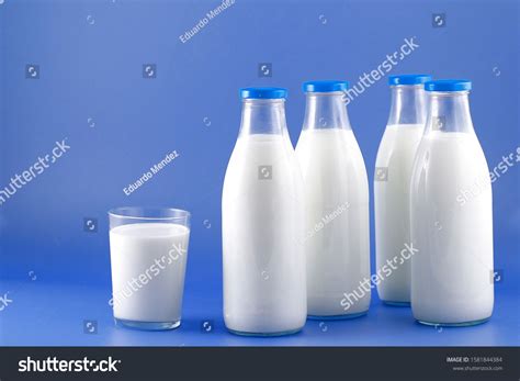 Bottle Of Milk Cow Dairy Product Used In Breakfast Ad Paid Cow