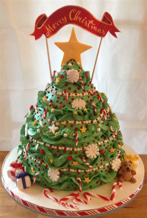These ideas for christmas cakes are mostly composed of christmas decorations and characters such as reindeer, decorated christmas tree designs, penguin, snow, ginger bread, santa claus, christmas gifts and more. Christmas Tree - CakeCentral.com