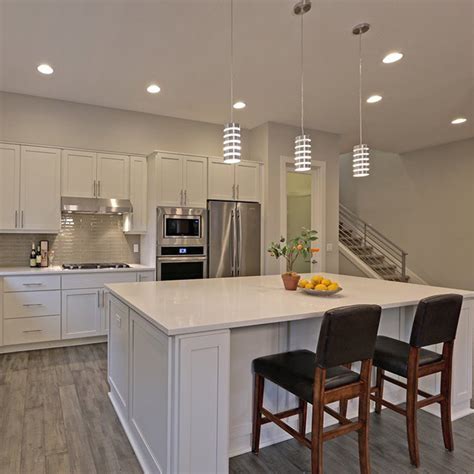 Custom cabinetry creates light and airy kitchen. China Modern White Shaker Kitchen Cabinets in Matt Finish ...