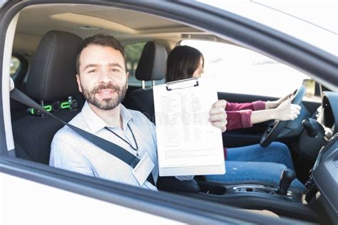 Car Instructor With Driver S Checklist Stock Photo Image Of Portrait