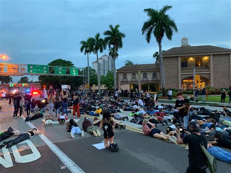 Large Group Of Protesters Demonstrate In Downtown Fort Myers