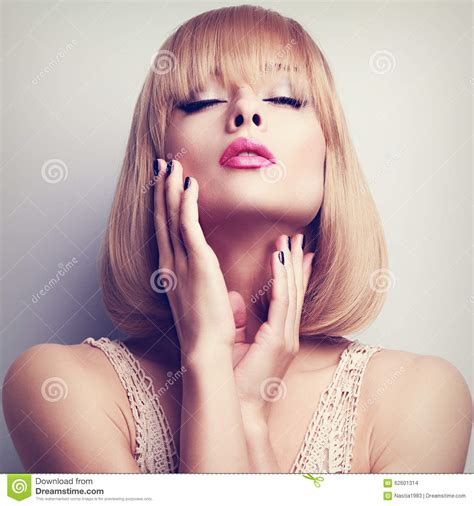 There are many beautiful short hairstyles and haircuts for thin hair, really. Beautiful Blond Short Hair Style Woman Touching The Hands ...