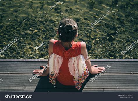 Top View Little Girl Sitting Pier Stock Photo 1319400773 Shutterstock