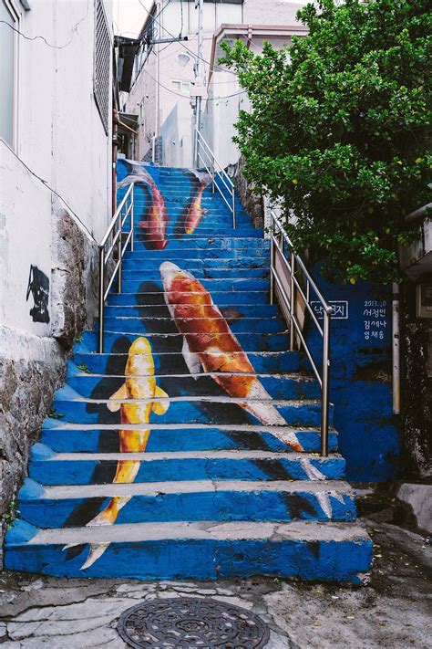 Staircase With Koi Fishes Which Means Good Luck In Asia Street Art