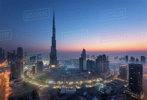 Cityscape Of Dubai United Arab Emirates At Dusk With The Burj Khalifa