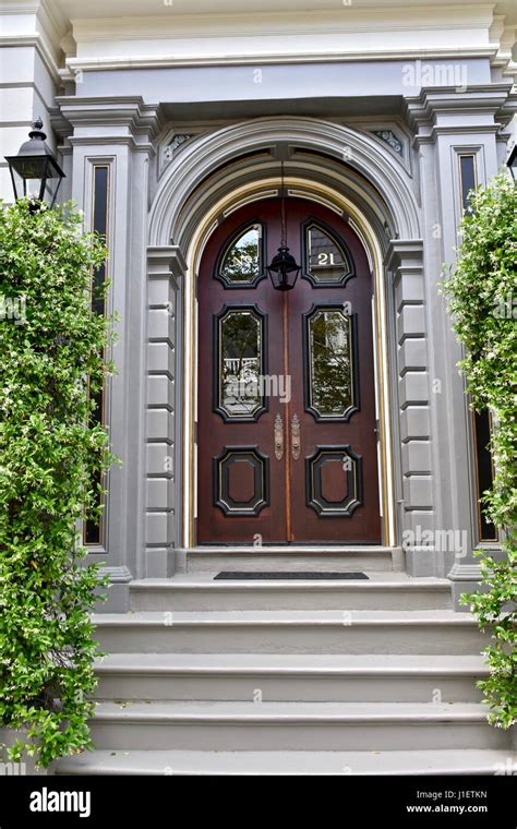 Grand Front Door Entrance To Beautiful Colonial Style Home In Stock