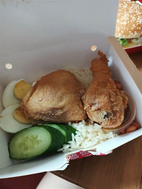 malaysia lunch fried chicken nasi lemak take away box cucumber hard boiled egg rice stock