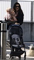 Rachel Weisz looks every inch the doting mother as she carries her baby ...