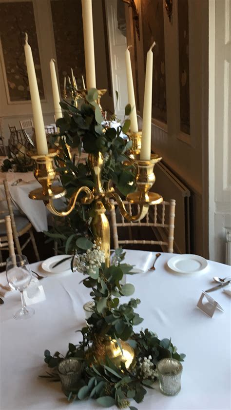 Candelabra With Foliage Garland And Wax Flower Yours Would Have More Flower Candle Wedding