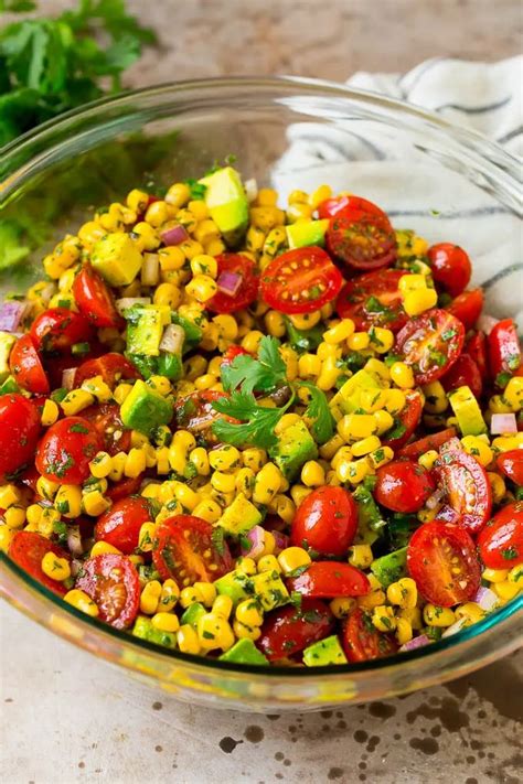 Easy Corn Salad With Tomato And Avocado All Tossed In A Zesty Lime