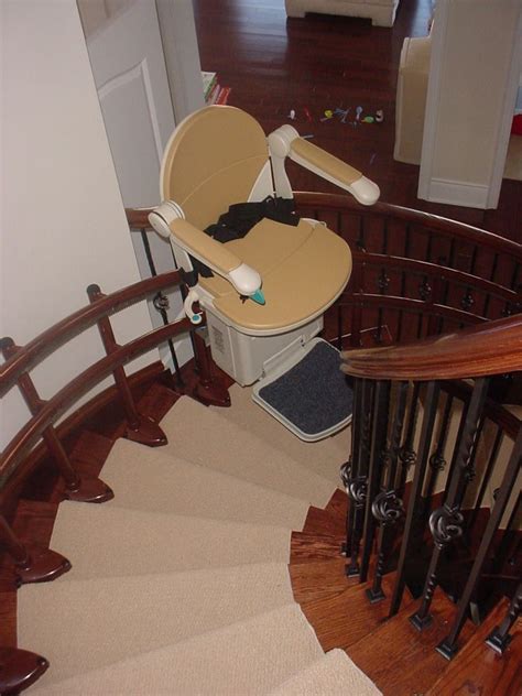 May not feel secure between the arms of a chair rated for a higher capacity. Curved stair lift with custom rail to match woodwork ...