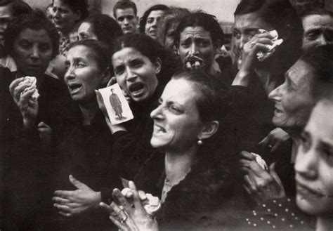 Famous Photographers Robert Capa Image Of A Group Of Women Crying And