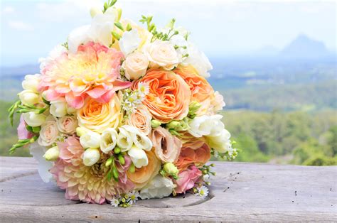 Gorgeous Peach Coral Pink And Ivory Bridal Bouquet Designed By Tiffanys