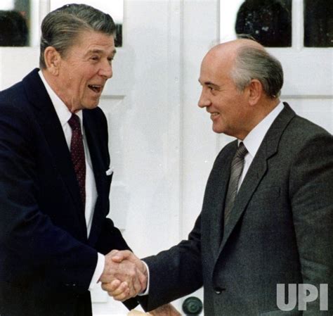 Photo President Reagan And Mikhail Gorbachev Shake Hands
