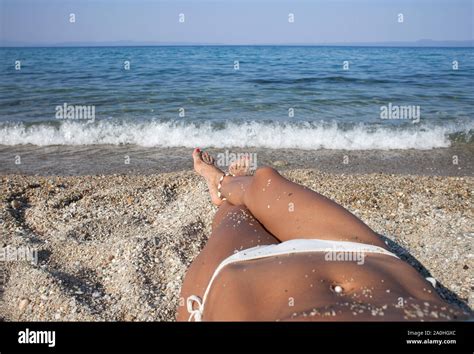 Woman Tanned Legs On Sand Beach Travel Concept Happy Feet In Tropical