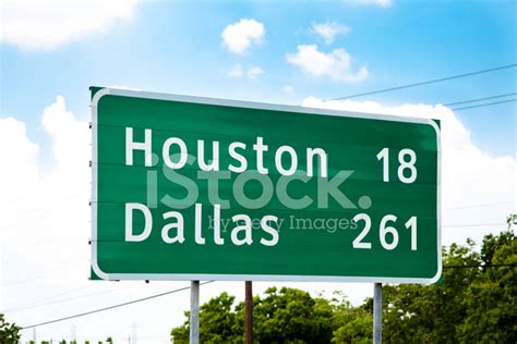Texas Highway Sign Showing Distance Houston And Dallas Mileage Stock
