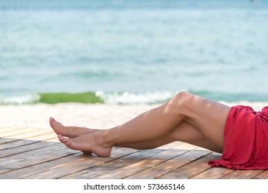 Womans Beautiful Legs On Beach Stock Photo 573665149 Shutterstock