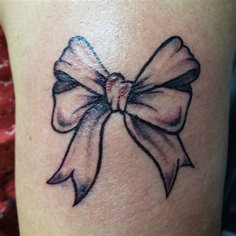 Bow Tattoos 30 Best Bow Tattoos Designs And Ideas