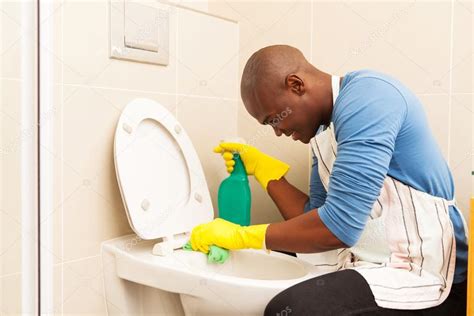 Man Cleaning Toilet Stock Photo By ©michaeljung 84851250