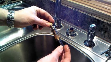 Removing that exposes a screw, which allows removal of the handle, etc. Moen Kitchen Faucet 1225 Cartridge Repair or Replacement ...