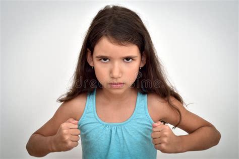 Angry And Aggressive Young Girl With Clenched Fists Stock Image Image