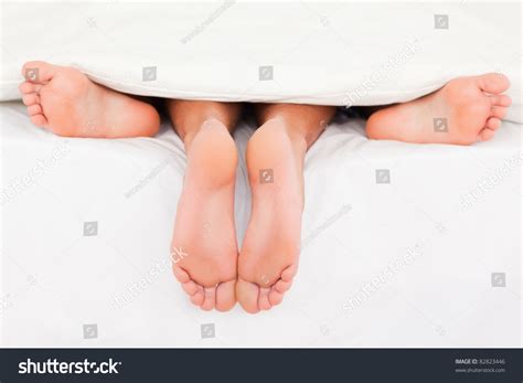 Pairs Feet Bed Stock Photo Edit Now 82823446