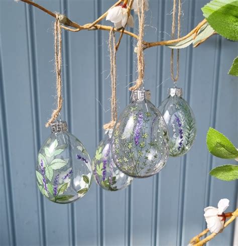 Set Of 4 Clear Glass Lavender And Herb Easter Egg Decoration By Gisela
