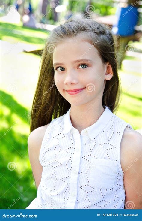 Portrait Of Adorable Smiling Little Girl Child Schoolgirl Teenager