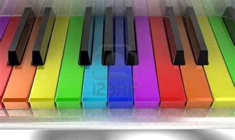 The White Piano With Keys Of Different Colours Of A Rainbow Colours